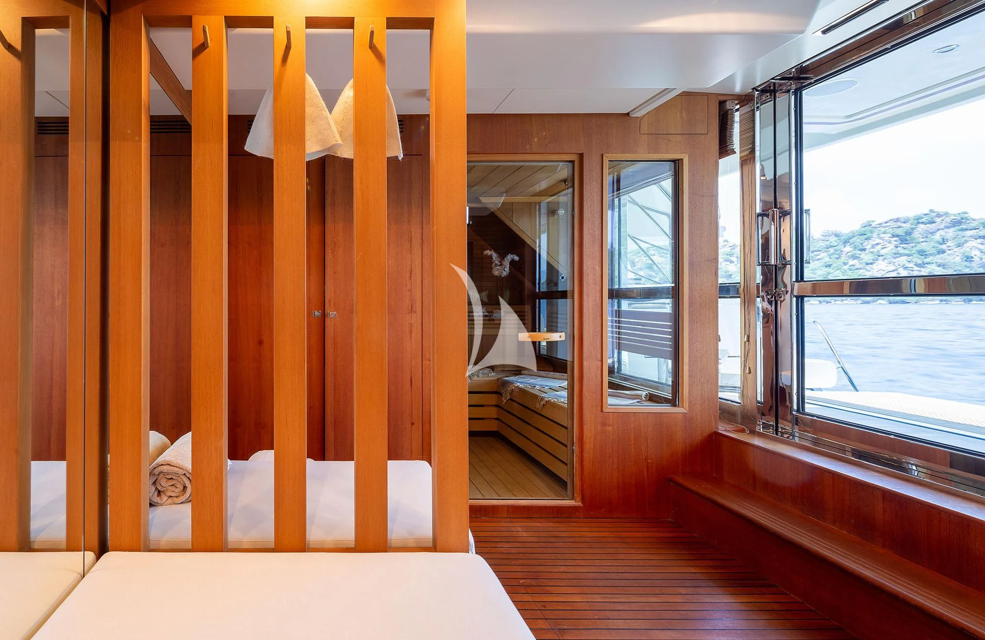 a cat sitting on a chair aboard LADY I Yacht for Charter