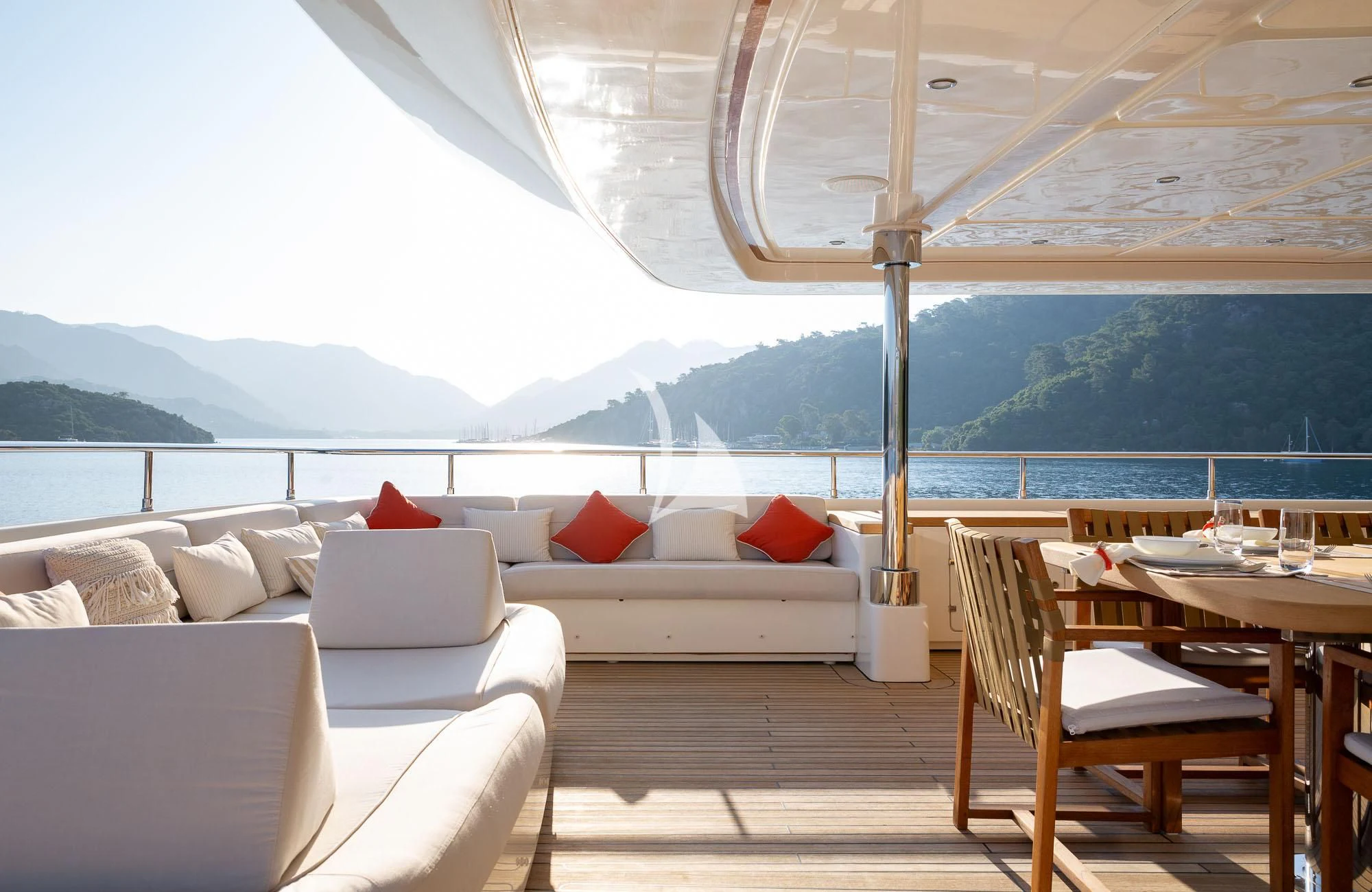 a room with a couch and a table and chairs aboard LADY I Yacht for Charter