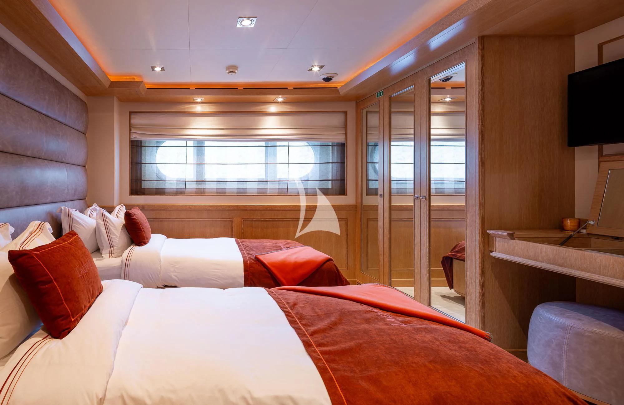 a bed in a room aboard LADY I Yacht for Charter