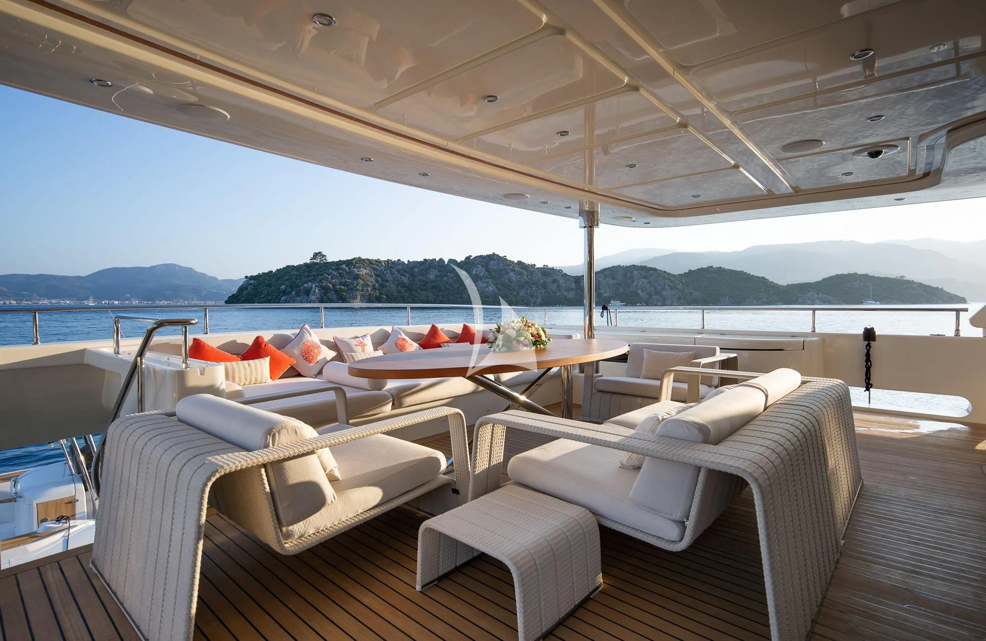 a boat with white couches aboard LADY I Yacht for Charter