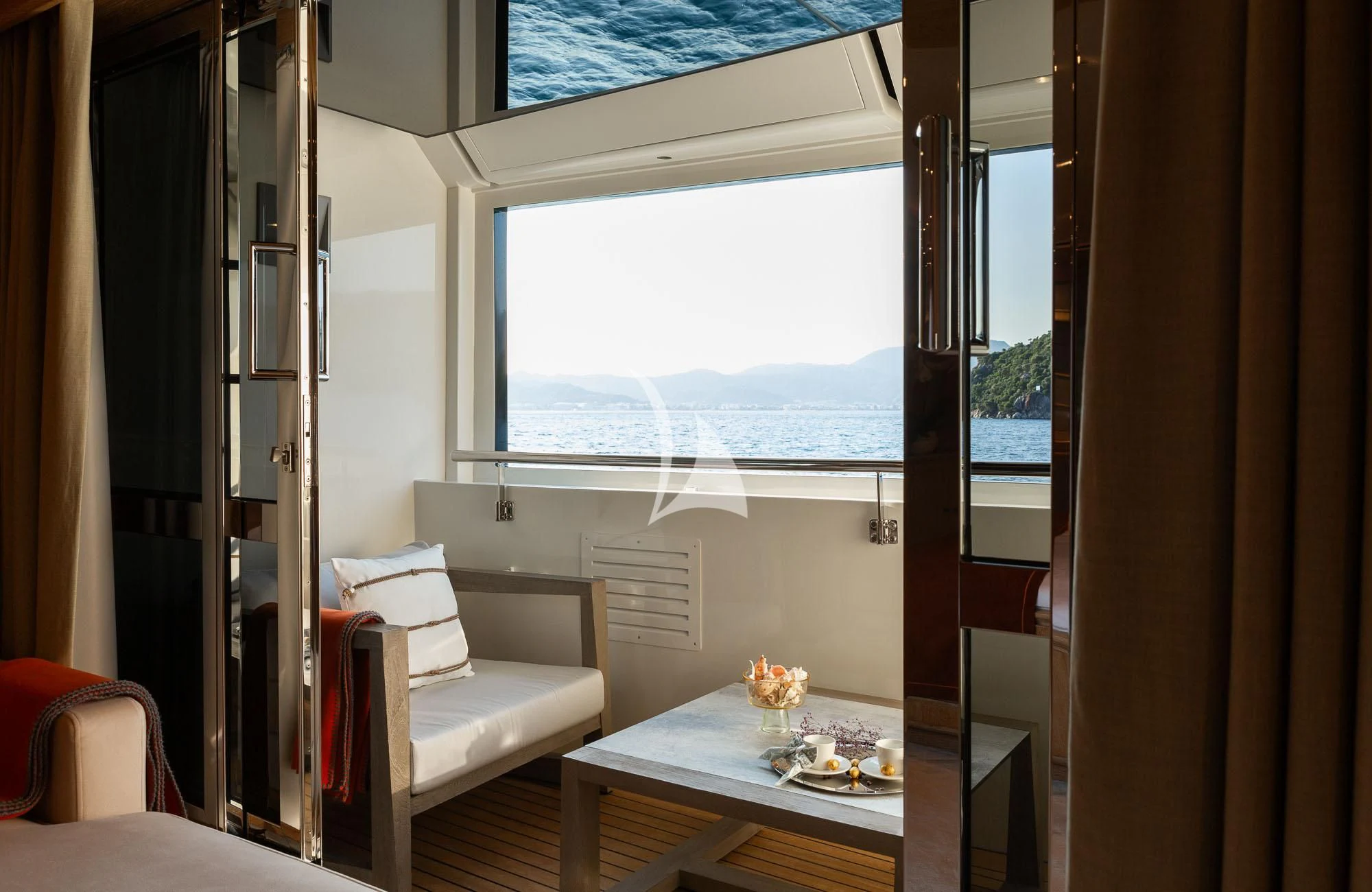 a room with a table and chairs aboard LADY I Yacht for Charter