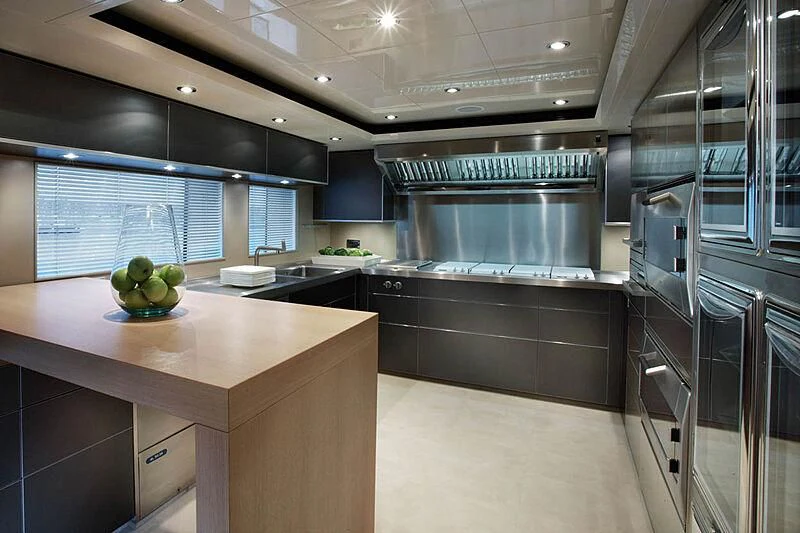 a kitchen with a stainless steel stove aboard LADY I Yacht for Charter
