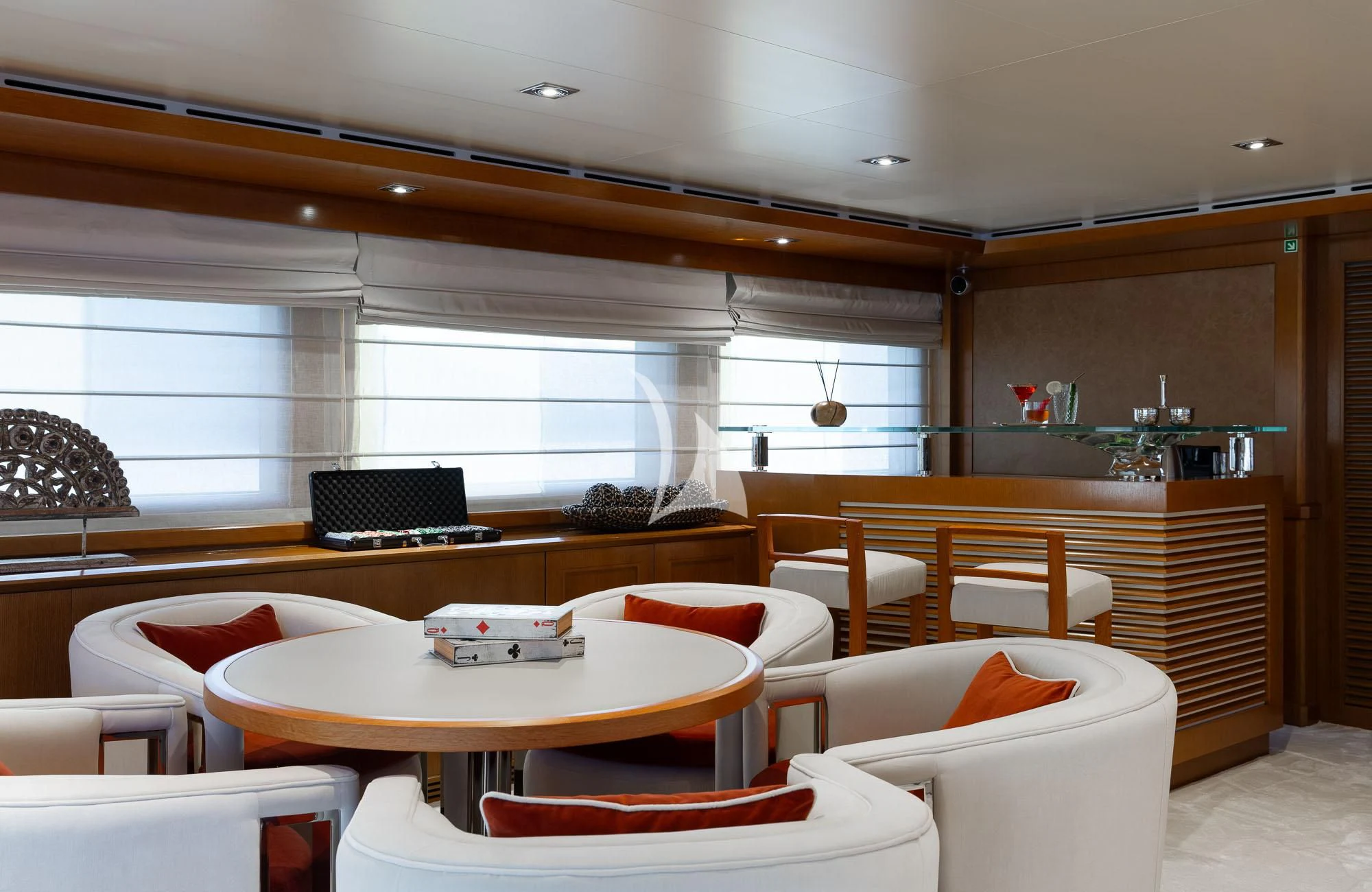 a room with a table and chairs aboard LADY I Yacht for Charter