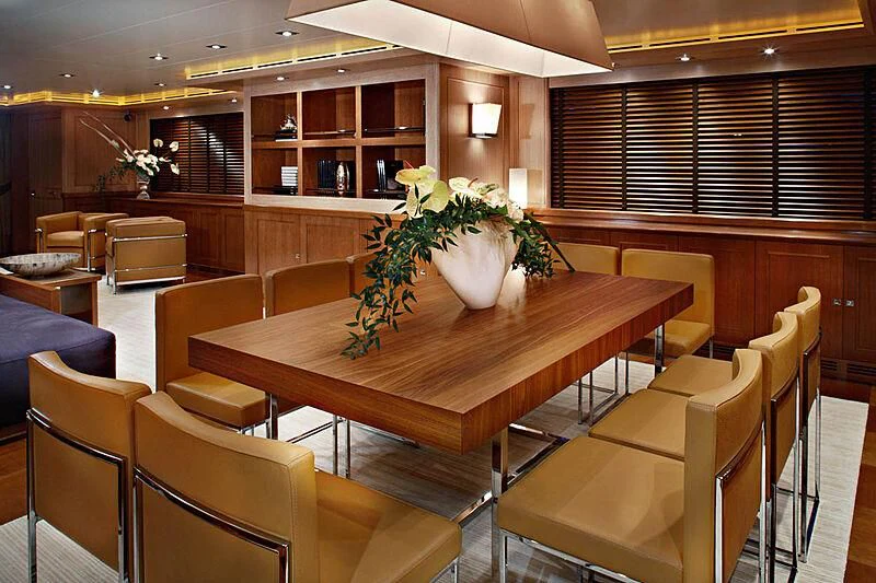 a room with a table and chairs aboard LADY I Yacht for Charter
