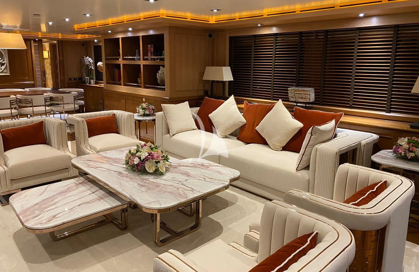 a living room with a couch and a table aboard LADY I Yacht for Charter