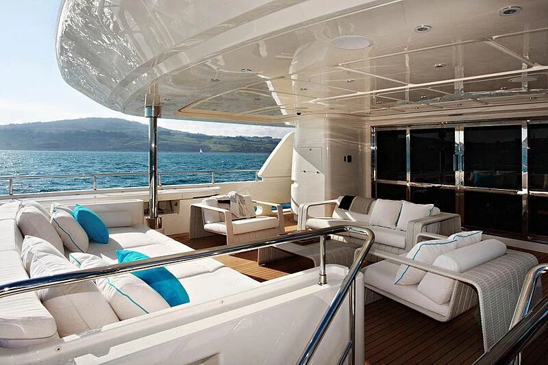 a room with a bed and a view of the ocean aboard LADY I Yacht for Charter