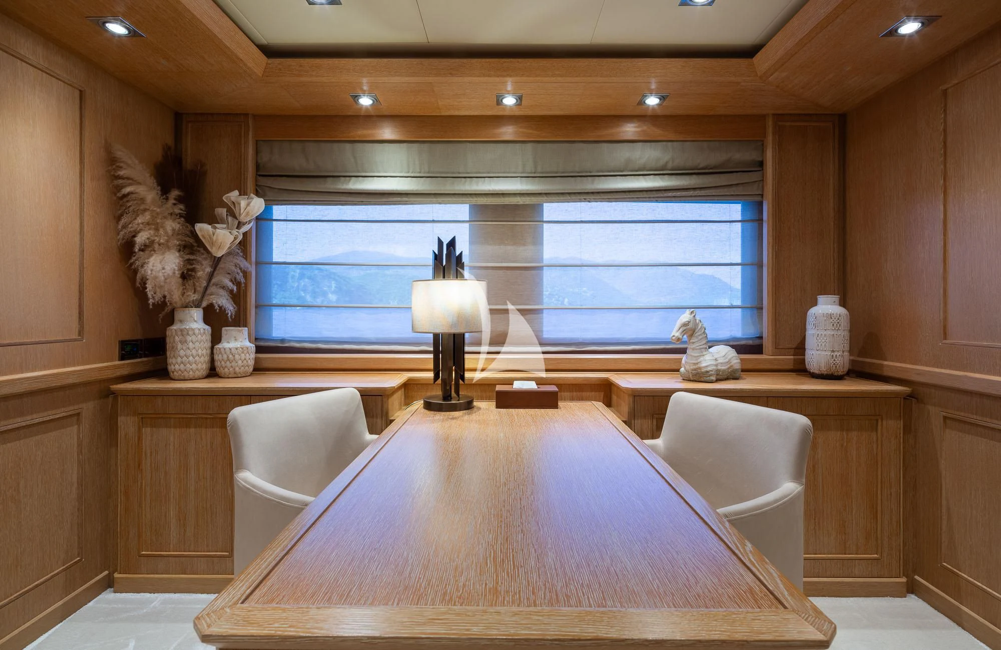 a room with a table and chairs aboard LADY I Yacht for Charter