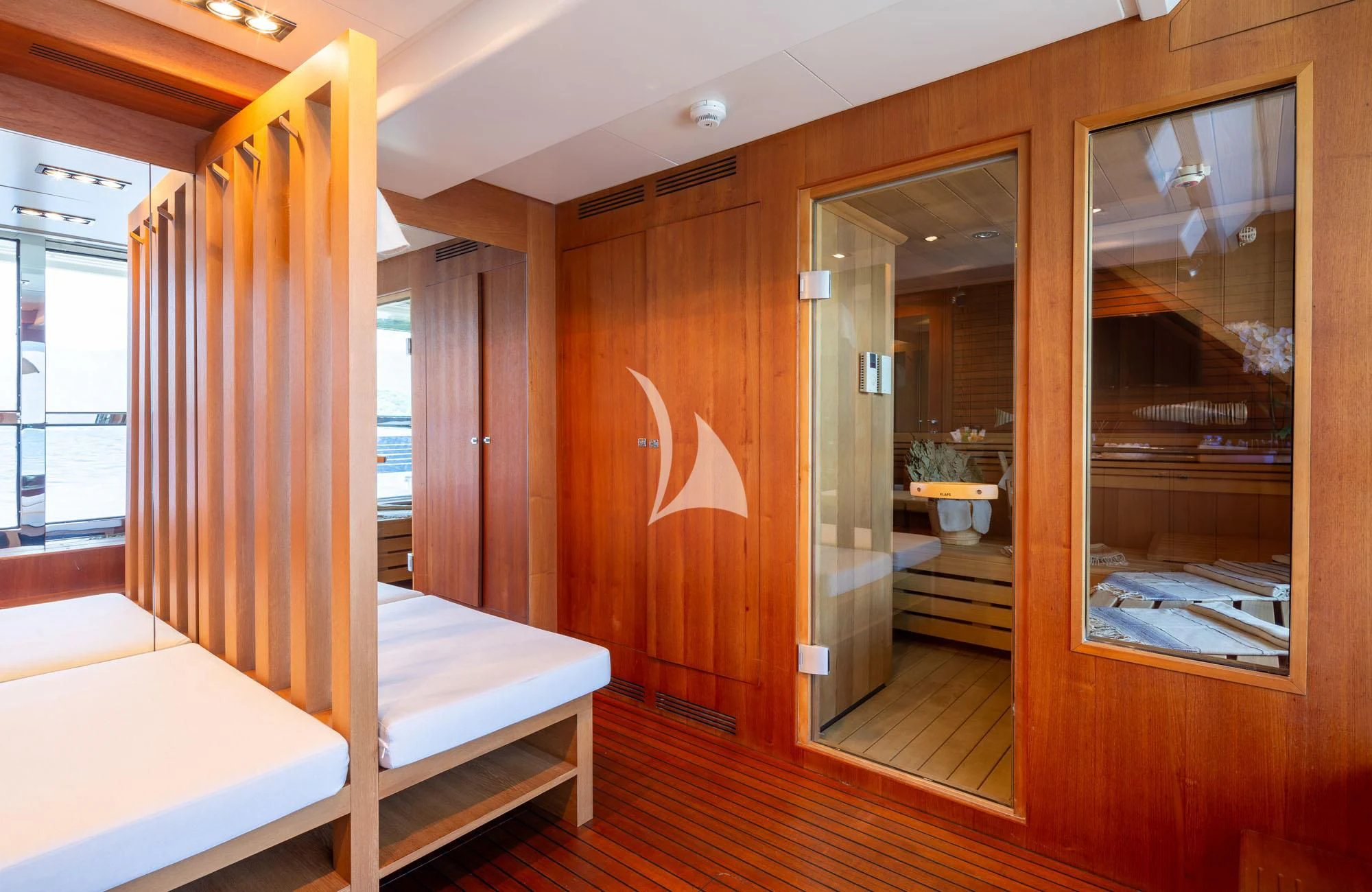 a room with a bed and a door aboard LADY I Yacht for Charter