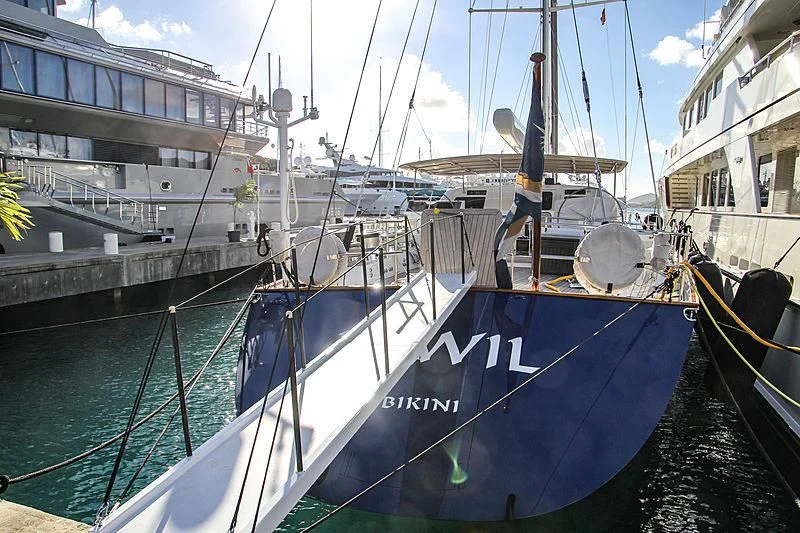 a boat docked in a harbor aboard KAWIL Yacht for Sale