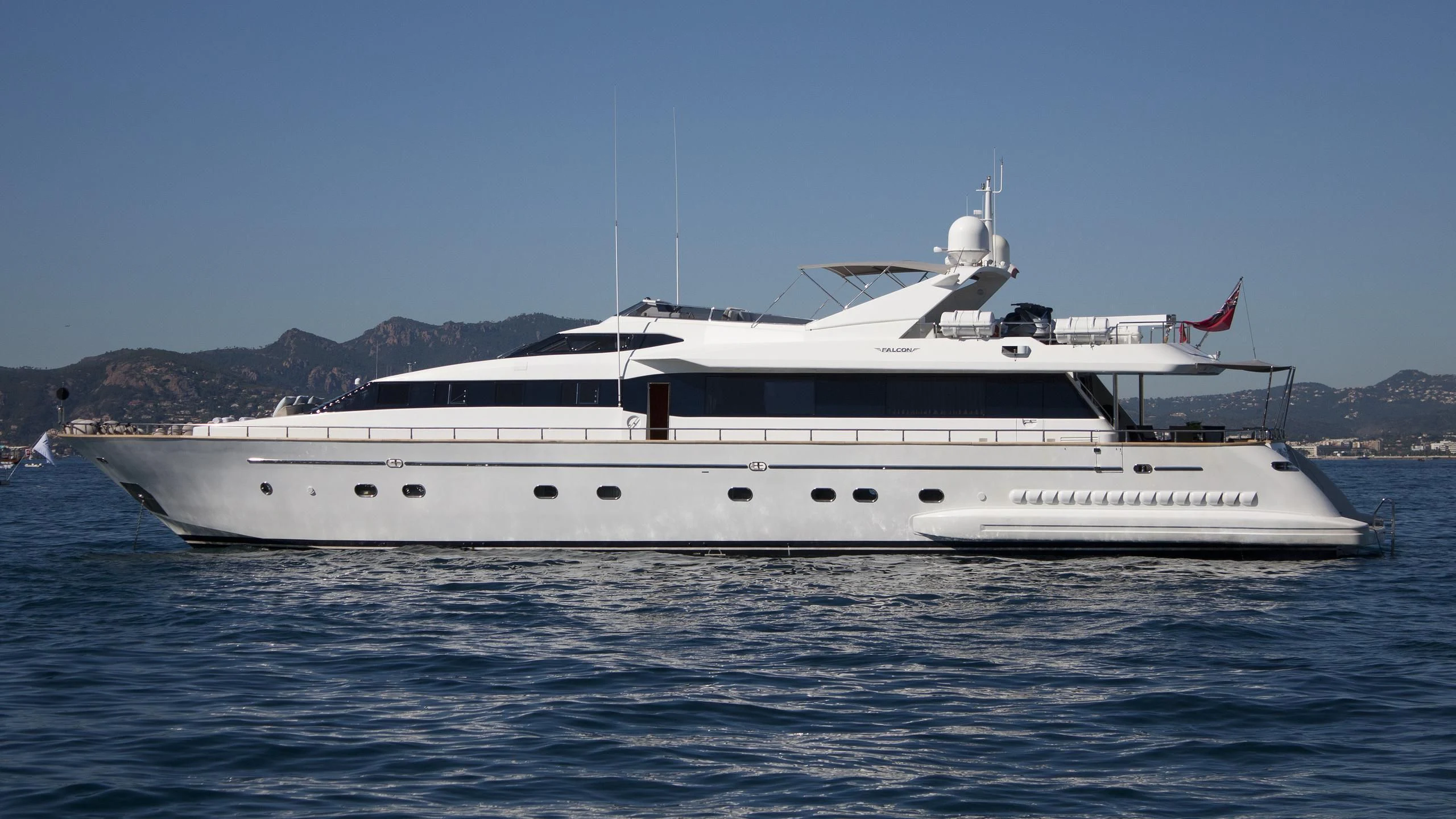 a white yacht in the water aboard SYNERGY Y Yacht for Sale