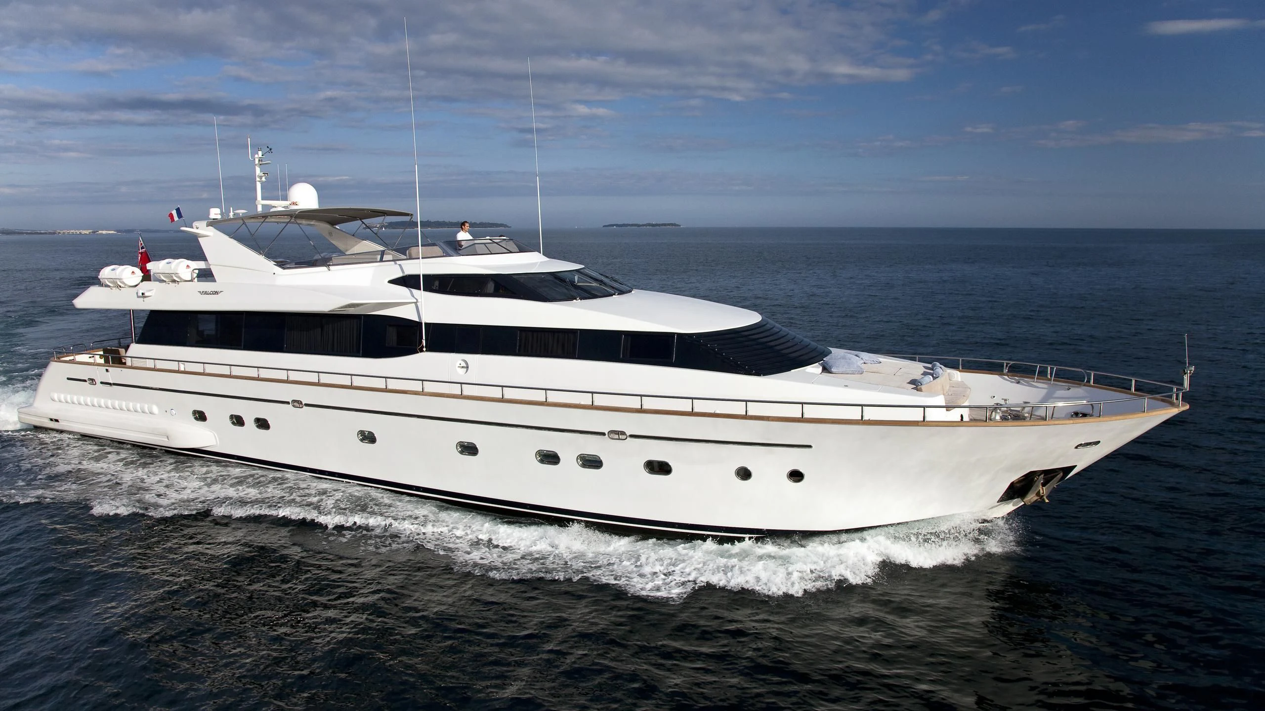 a white yacht in the water aboard SYNERGY Y Yacht for Sale