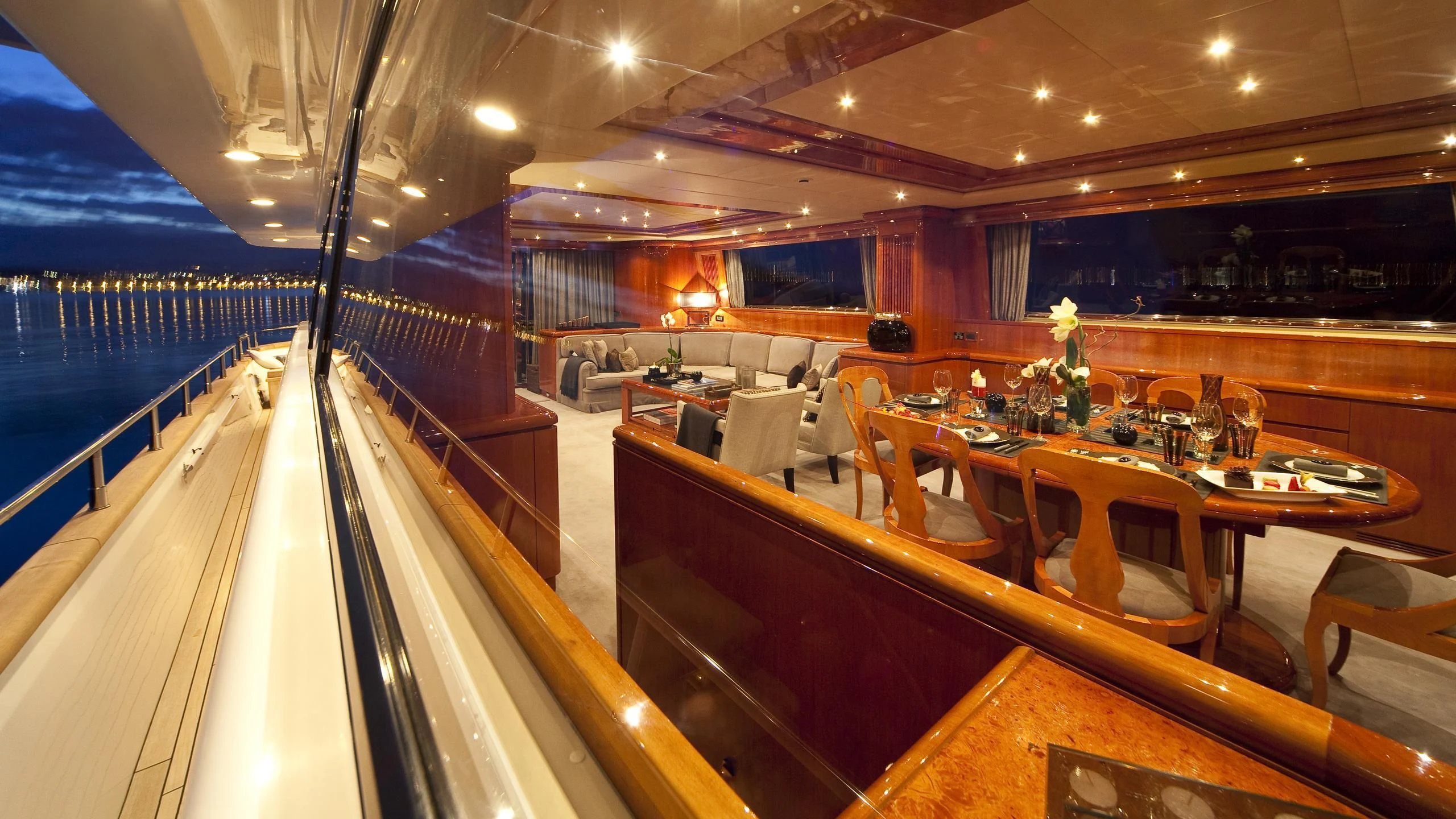 a restaurant with a large balcony aboard SYNERGY Y Yacht for Sale