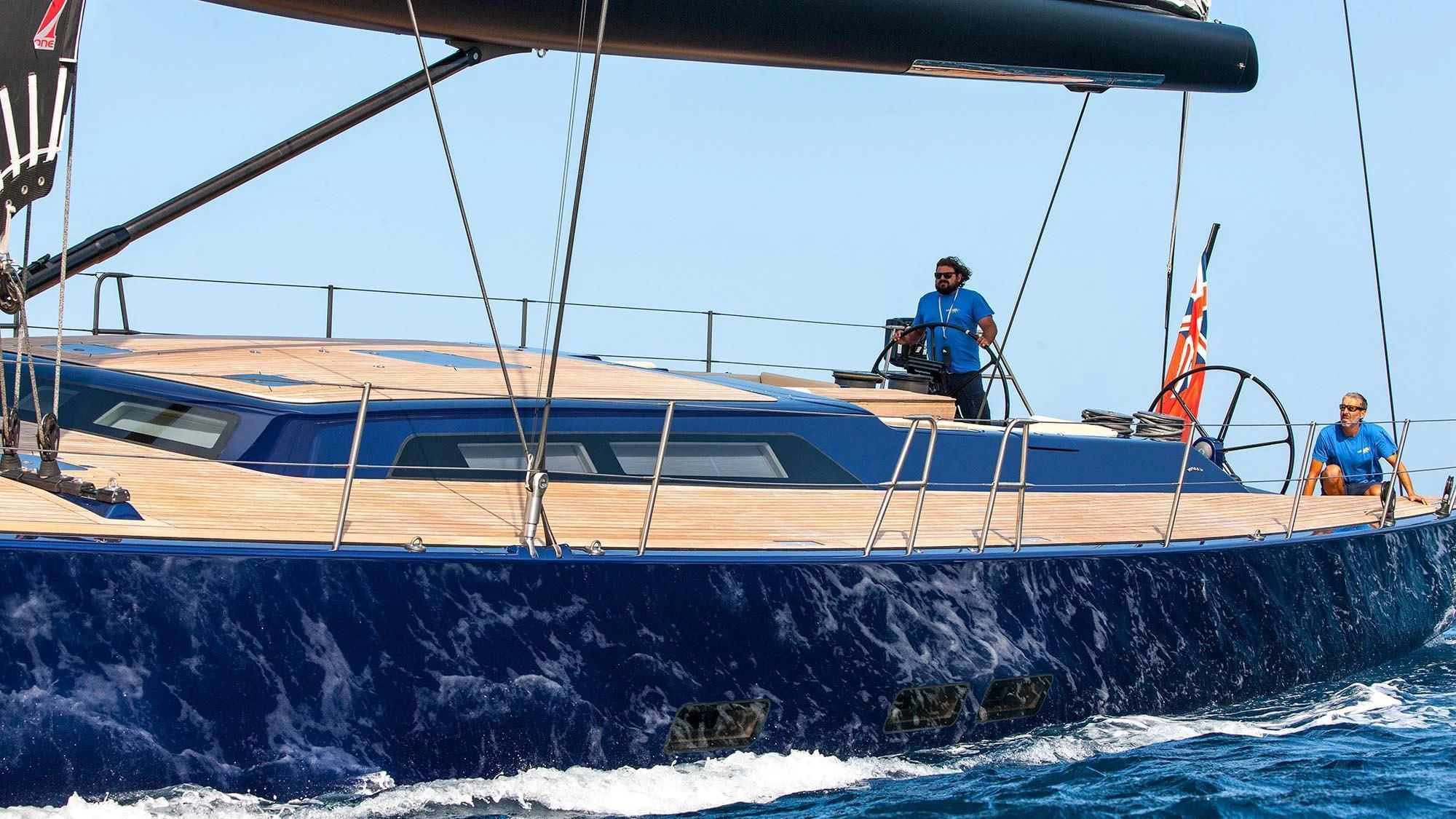 a couple of men on a boat aboard INTI CUBE Yacht for Sale