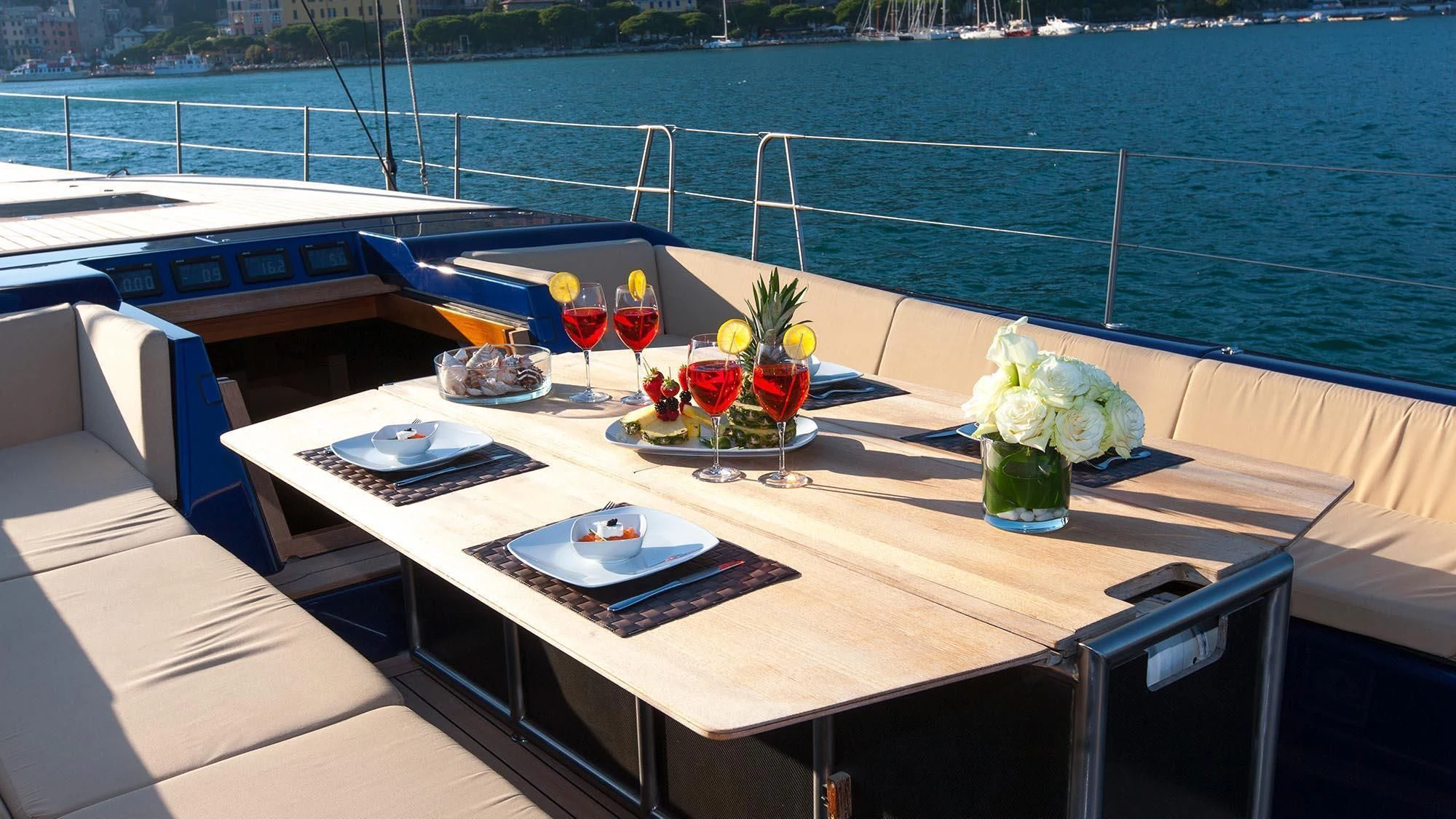 a table with drinks on it aboard INTI CUBE Yacht for Sale