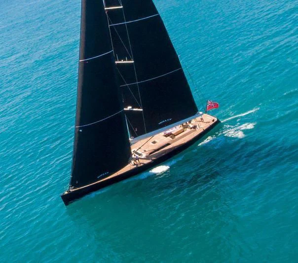a black and white boat in the water aboard INTI CUBE Yacht for Sale