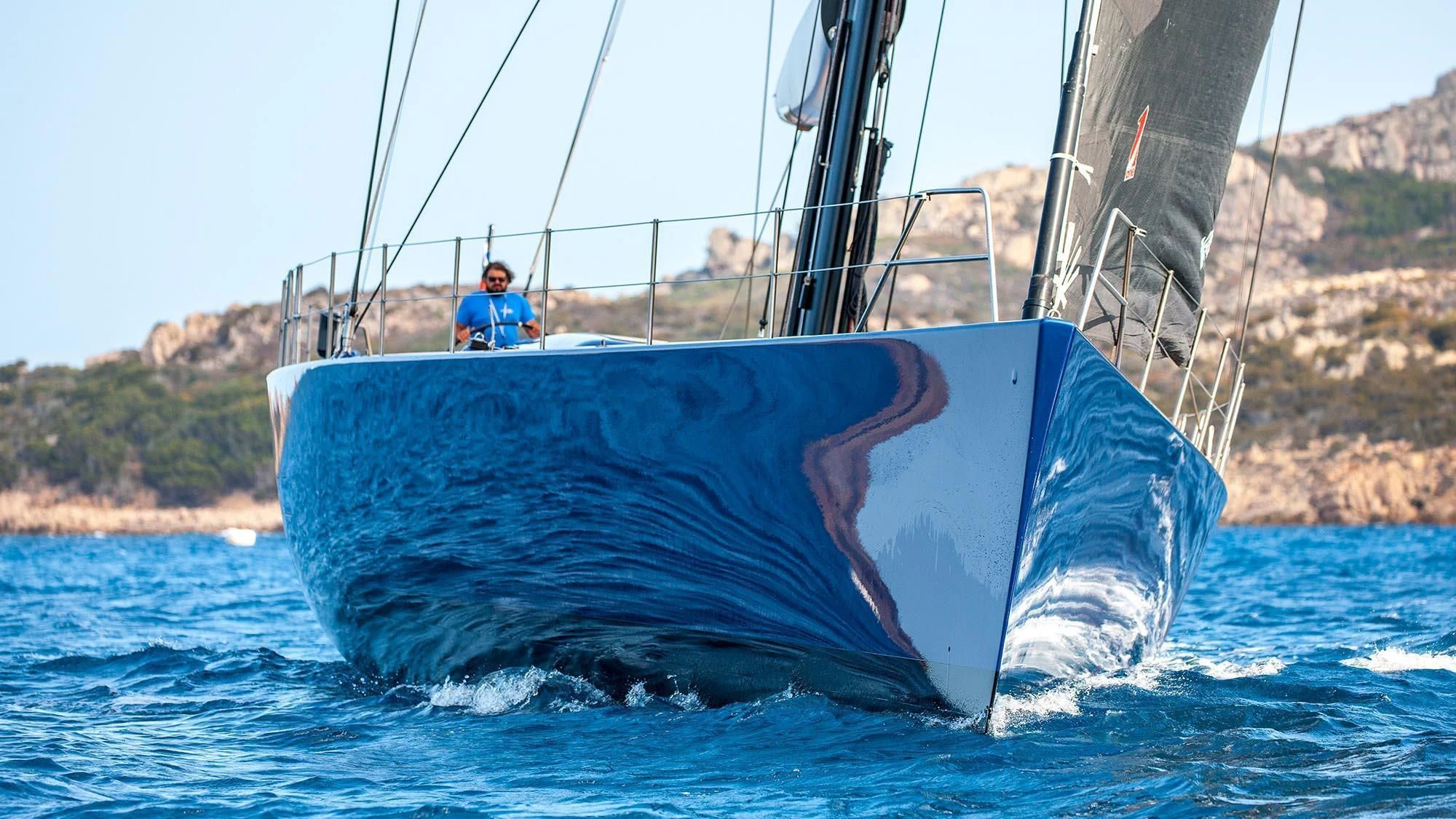 a man on a sailboat aboard INTI CUBE Yacht for Sale