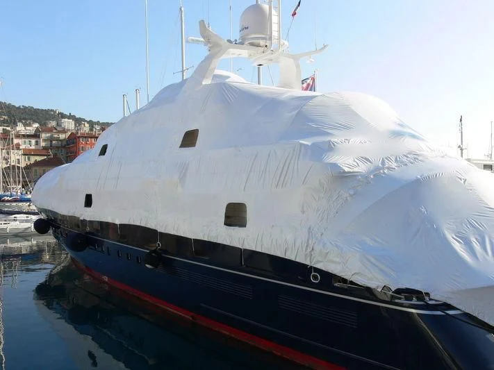 a large white ship docked aboard ASTRA ULTIMA Yacht for Sale