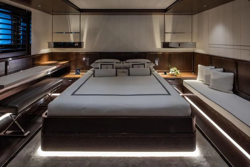a room with a bed and a couch aboard ATLANTE Yacht for Sale