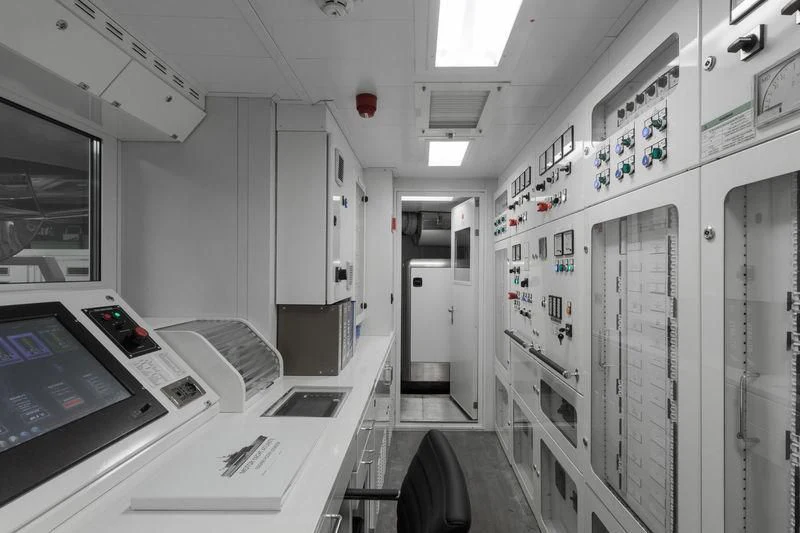 a room with several computers aboard ATLANTE Yacht for Sale