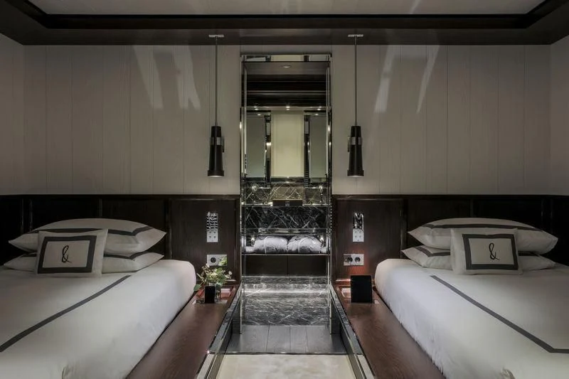 a room with a bed and a mirror aboard ATLANTE Yacht for Sale