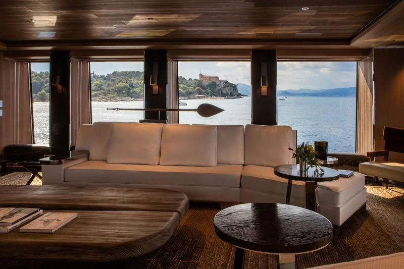 a living room with a large window aboard ATLANTE Yacht for Sale