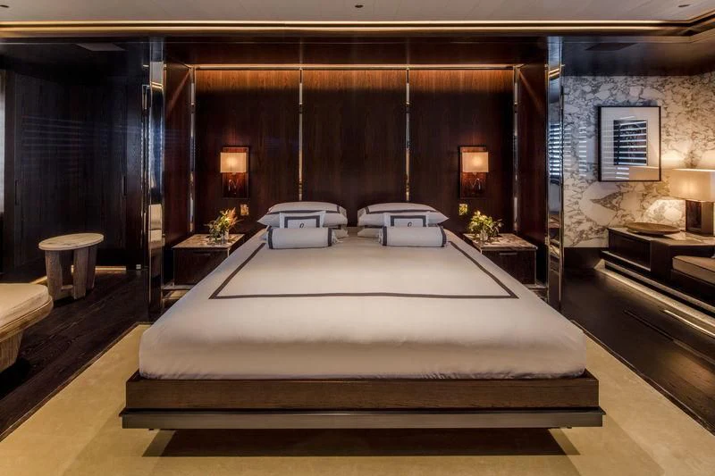 a room with a bed and a couch aboard ATLANTE Yacht for Sale