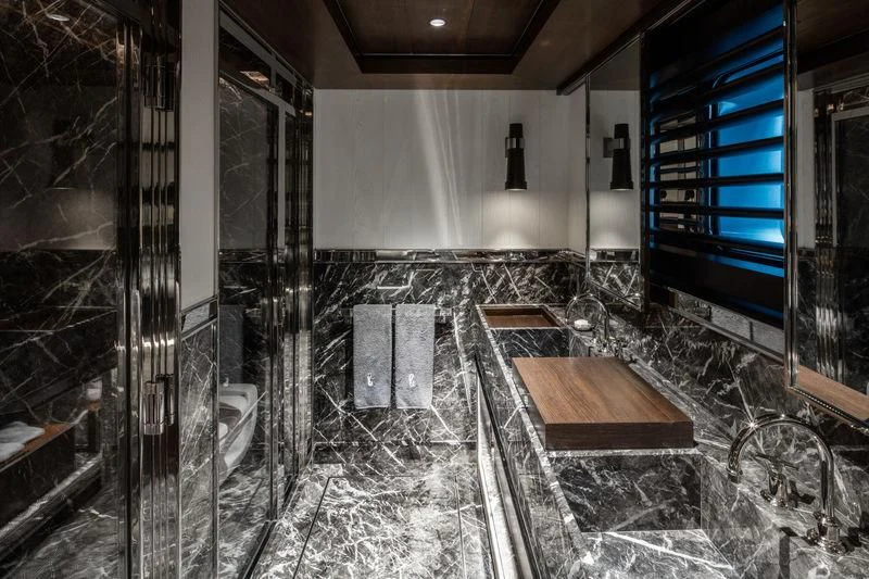 a room with a large tub and a bench aboard ATLANTE Yacht for Sale