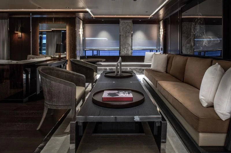 a living room with a fireplace aboard ATLANTE Yacht for Sale
