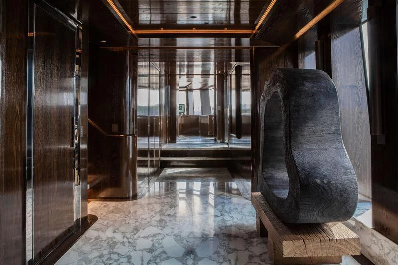 a leather chair in a room aboard ATLANTE Yacht for Sale