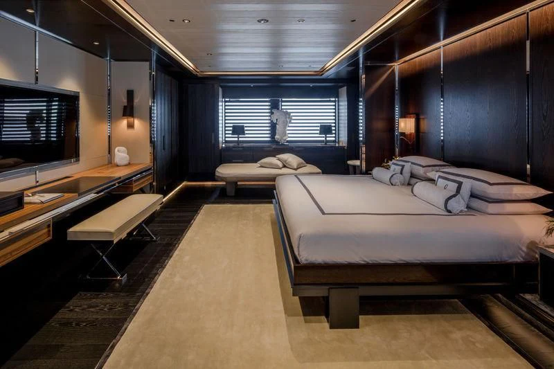 a room with a bed and a tv aboard ATLANTE Yacht for Sale