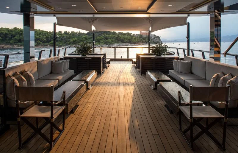 a large living room with a wood floor aboard ATLANTE Yacht for Sale