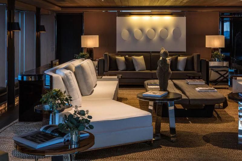 a living room with a couch and a coffee table aboard ATLANTE Yacht for Sale