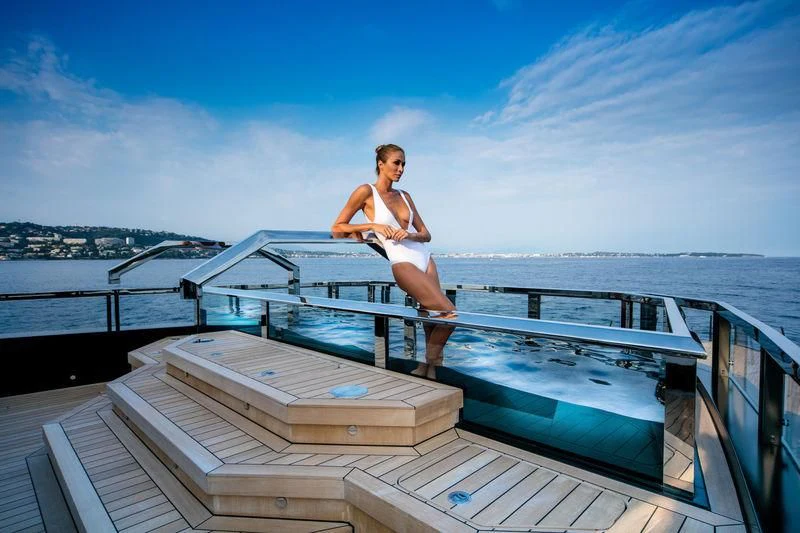 a person standing on a deck aboard ATLANTE Yacht for Sale