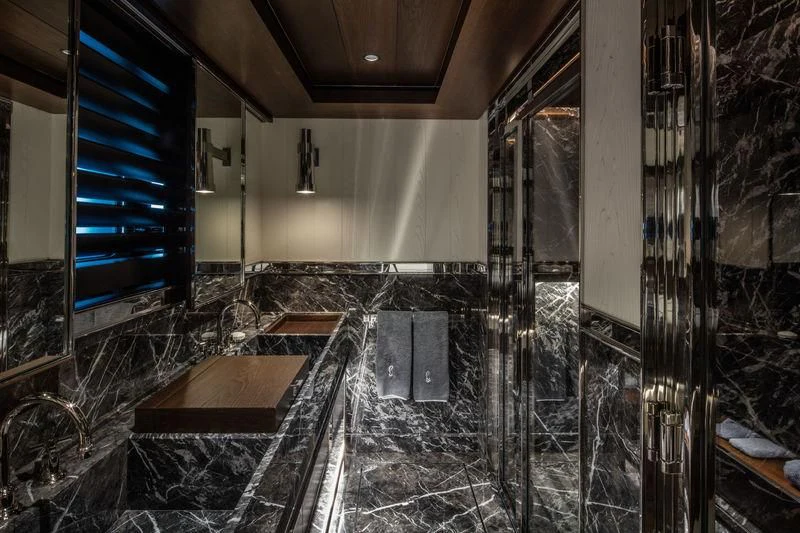 a room with a large glass window aboard ATLANTE Yacht for Sale