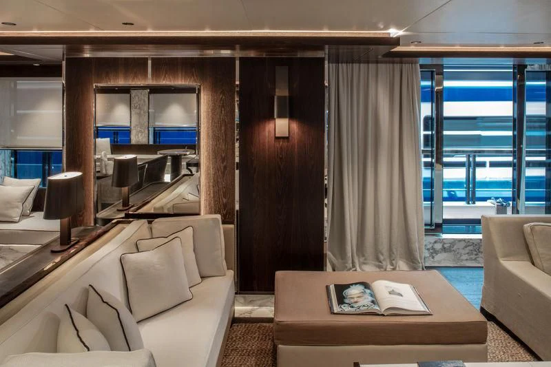 a room with a couch and a table aboard ATLANTE Yacht for Sale