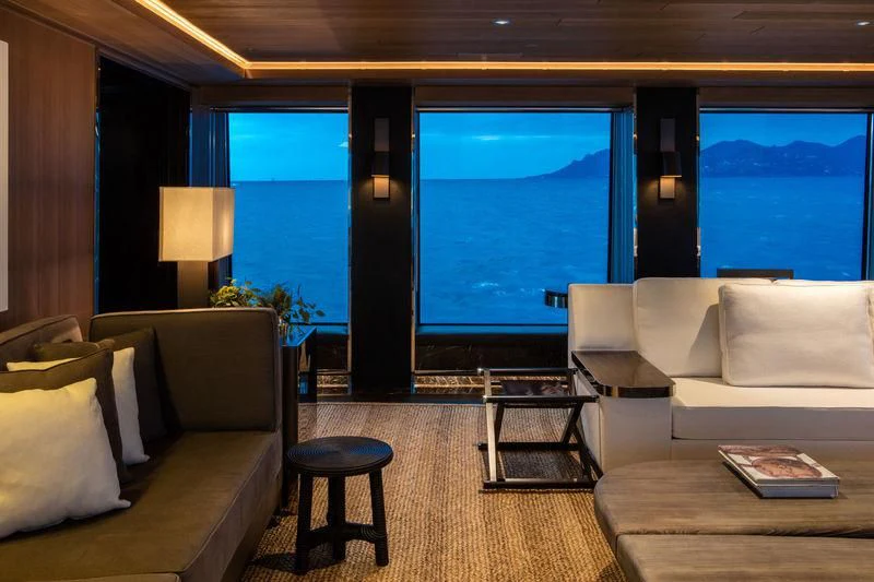 a living room with a large window aboard ATLANTE Yacht for Sale