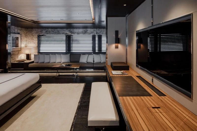 a room with a couch and a tv aboard ATLANTE Yacht for Sale