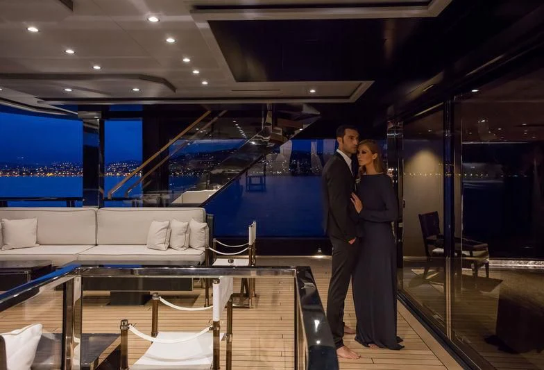a man and woman kissing aboard ATLANTE Yacht for Sale