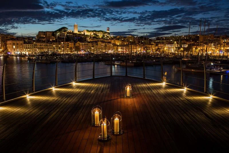 a city with lights on aboard ATLANTE Yacht for Sale