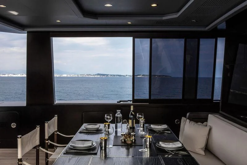 a table set for a dinner aboard ATLANTE Yacht for Sale