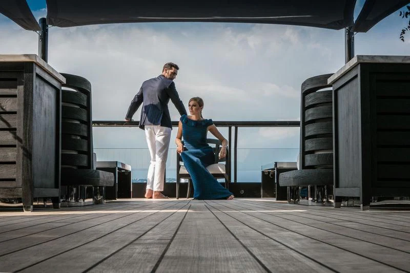 a man and woman dancing on a stage aboard ATLANTE Yacht for Sale