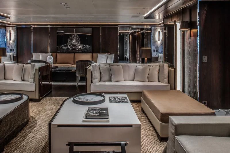 a living room with a couch and a coffee table aboard ATLANTE Yacht for Sale