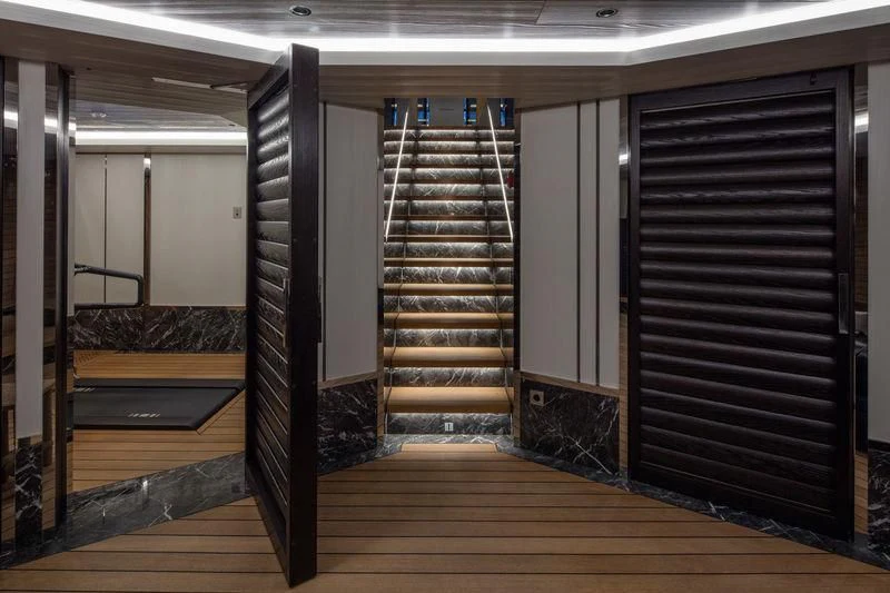 a large wooden staircase in a building aboard ATLANTE Yacht for Sale