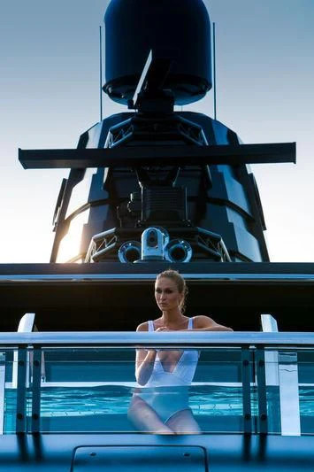 a person sitting on a blue platform aboard ATLANTE Yacht for Sale