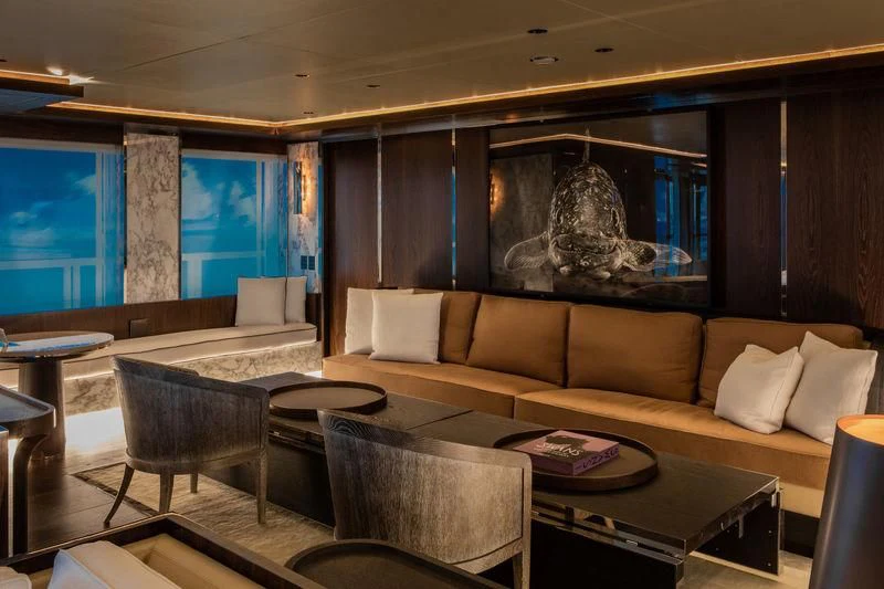 a living room with a large window aboard ATLANTE Yacht for Sale