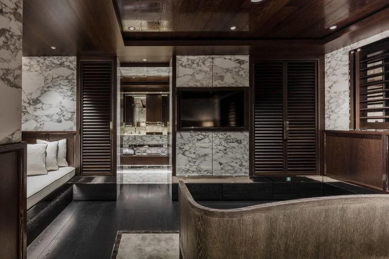 a room with a bed and a bathtub aboard ATLANTE Yacht for Sale