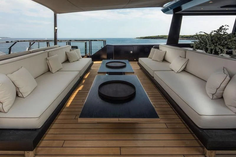 a deck with a large pool aboard ATLANTE Yacht for Sale