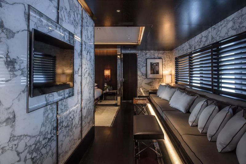 a room with a couch and a bed aboard ATLANTE Yacht for Sale