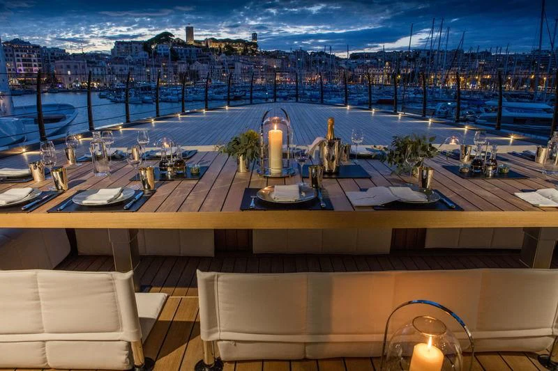a room with a view of a city and water aboard ATLANTE Yacht for Sale