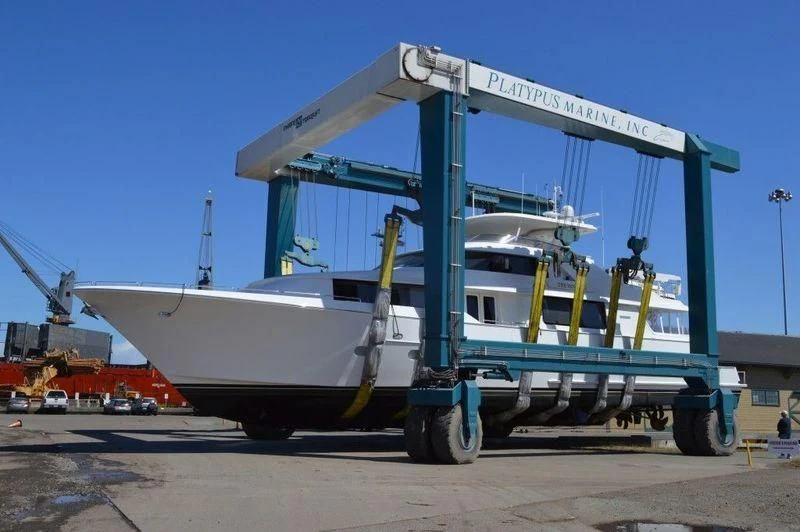 a large white boat on a trailer aboard LEGEND Yacht for Sale